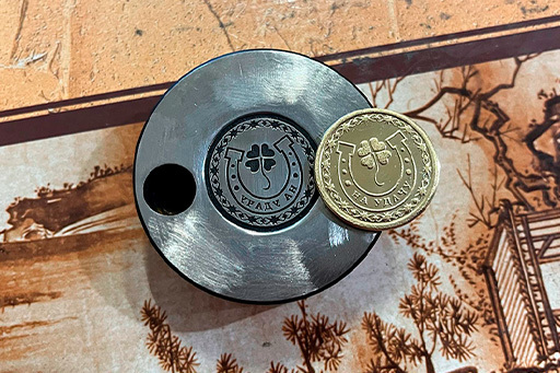 аттракцион чеканка монет